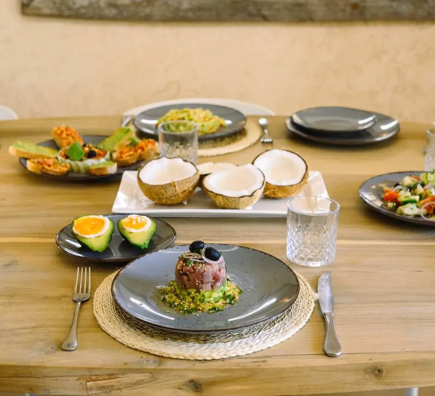 Breakfast laid out on the long table at Villa Kokos