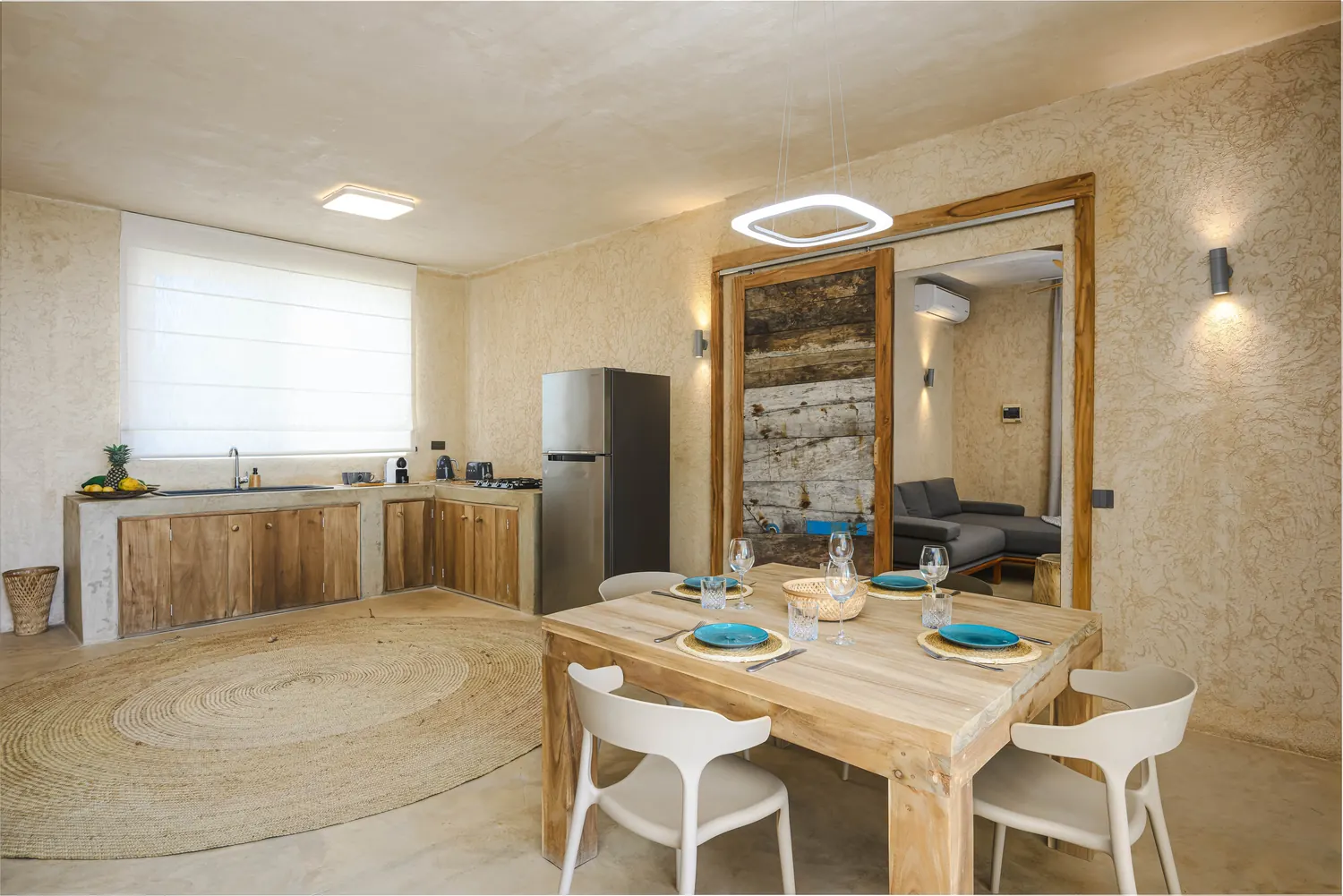 Dining area and kitchen with handcrafted wooden details
