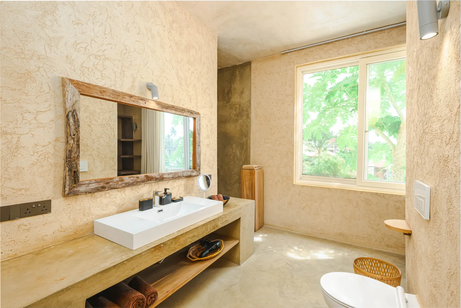 Ensuite bathroom with designer basin and wooden mirror
