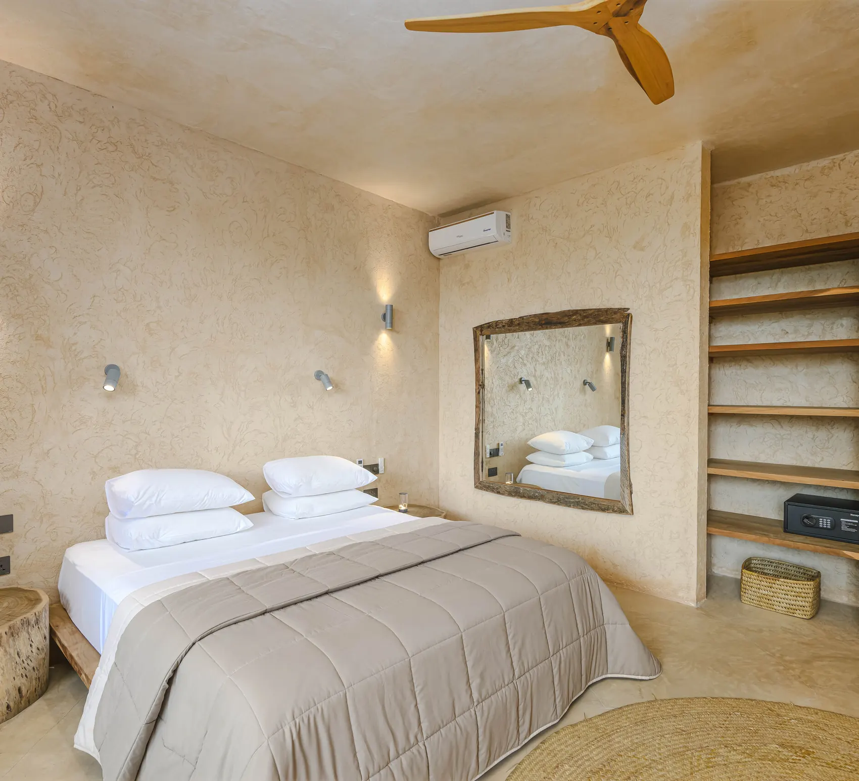 Master suite at Villa Kokos with king-size bed and open wardrobe